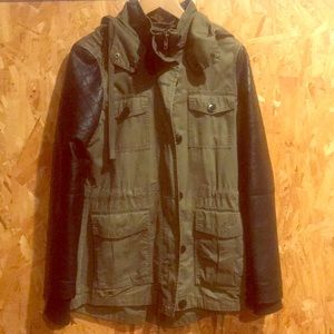 green jacket with leather arms